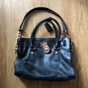 Michael Kors black and rose gold handbag
